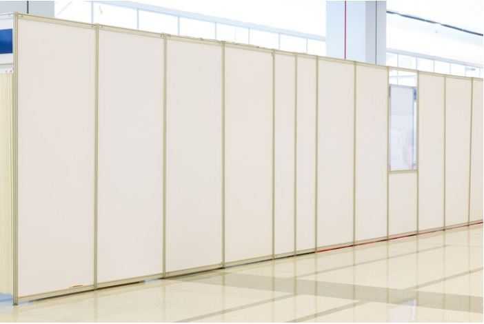 A newly installed free standing partition wall in office.